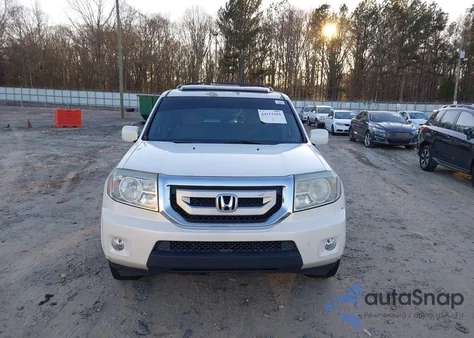 2011 Honda Pilot Touring z USA, uszkodzony, nr VIN 5FNYF3H99BB052009